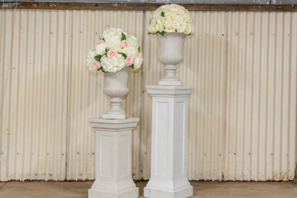 Pedestals with urns