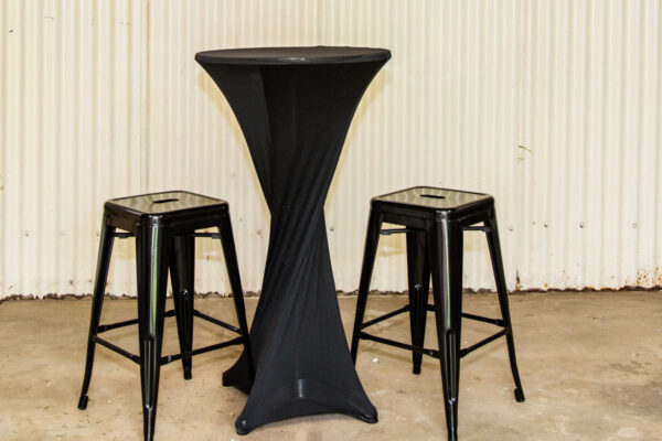 Black cocktail table with black bar stools