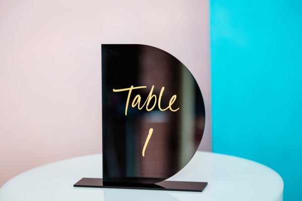 Black D gloss acrylic with gold lettering