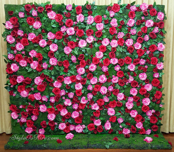 Red, hot pink flowers with greenery