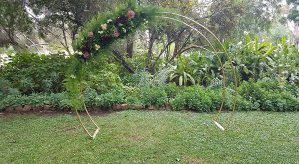 Gold moon arch with fresh florals