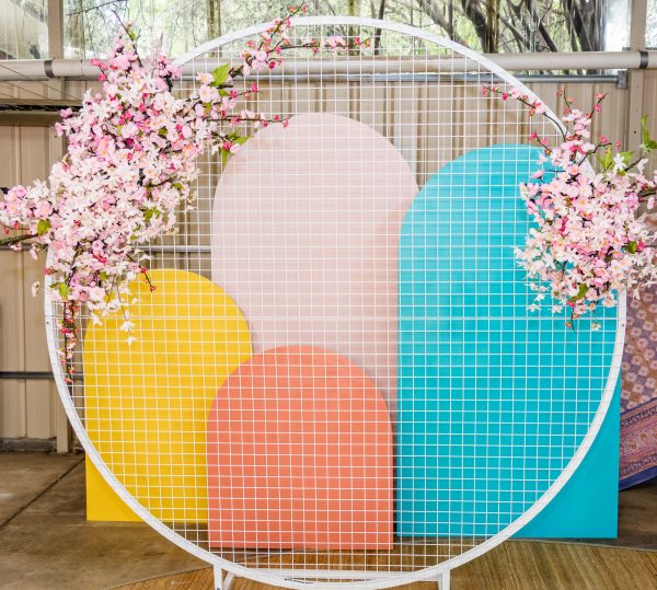 Cherish florals on white mesh back drop