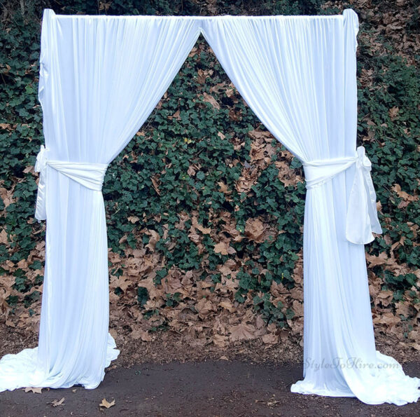 White drapery arch